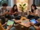 Play games online with friends in a cozy living room, featuring vibrant card game interfaces and an inviting atmosphere.